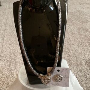 SILVER LEATHER NECKLACE WITH 2 CHARMS